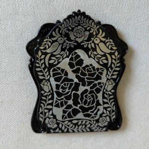 anna sui mirror